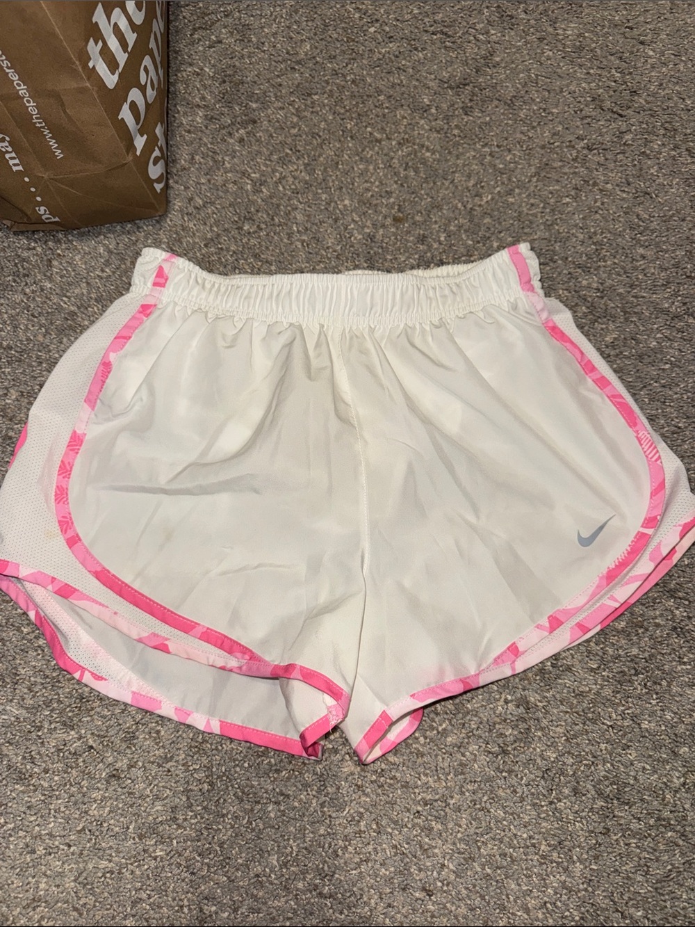 Nike Women's White Athletic Shorts with Pink Trim Accents